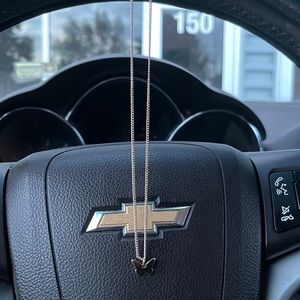 It’s a gold butterfly necklace